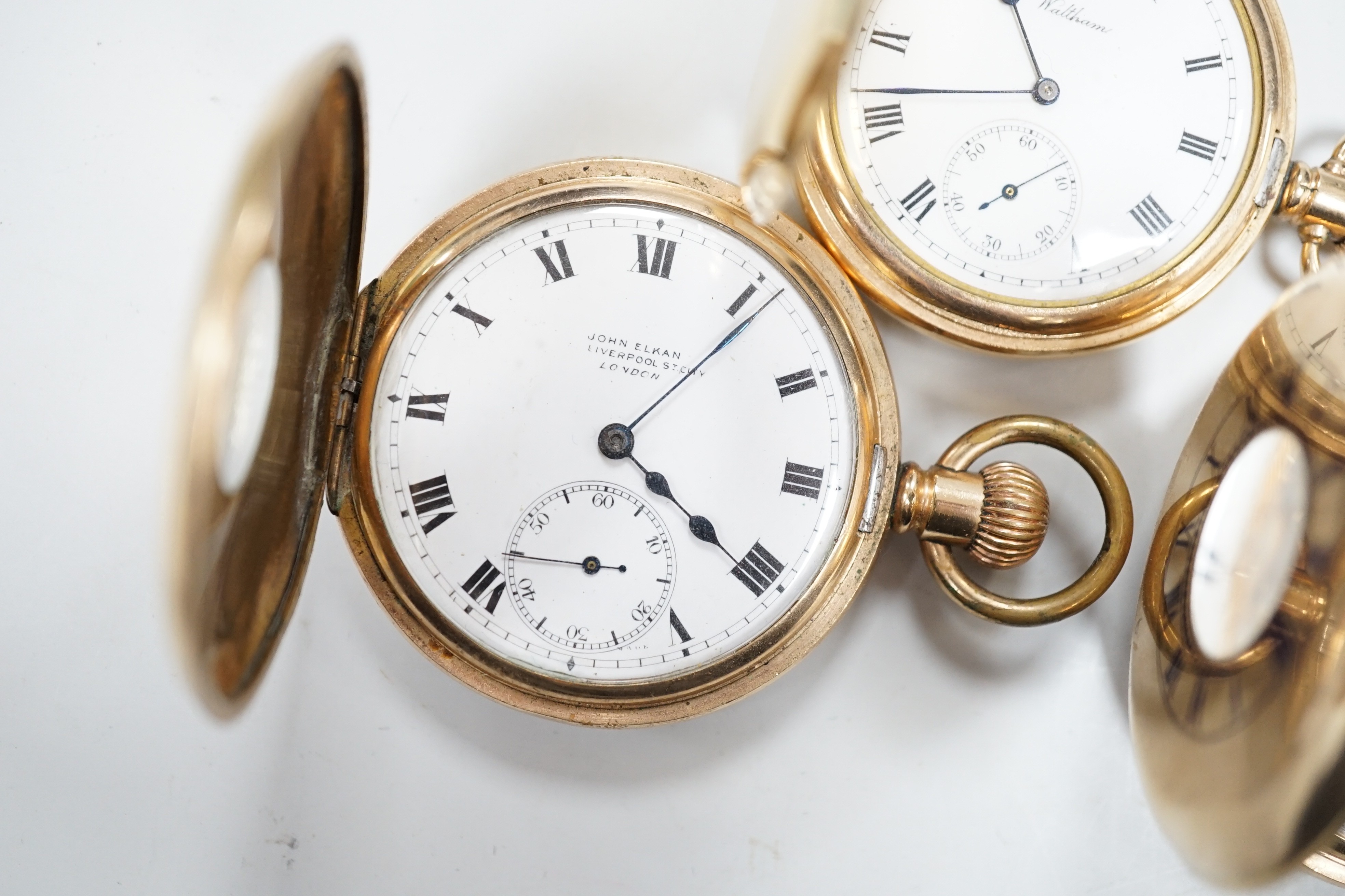 A gold plated Waltham hunter keyless pocket watch and two gold plated half hunter pocket watches, John Elkin and Garrard.